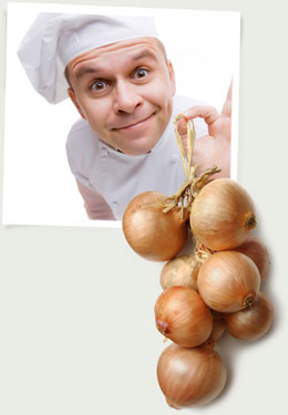chef holding onions