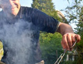 man barbecuing